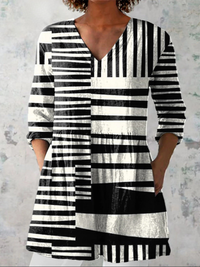 DILETTA | Blusa lunga con scollo a V