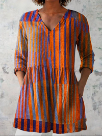 ANNETTA | Blusa lunga con scollo a V